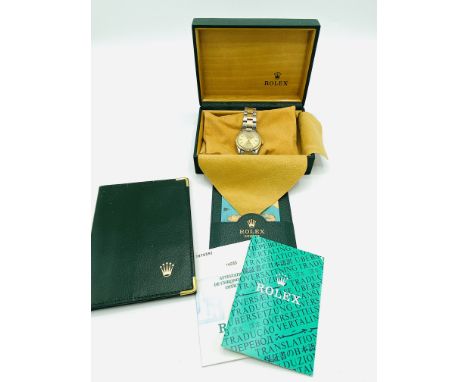 A gentleman's bi-metal Rolex Oyster Perpetual superlative chronometer wristwatch, with a gilt dial and batons, serial number 