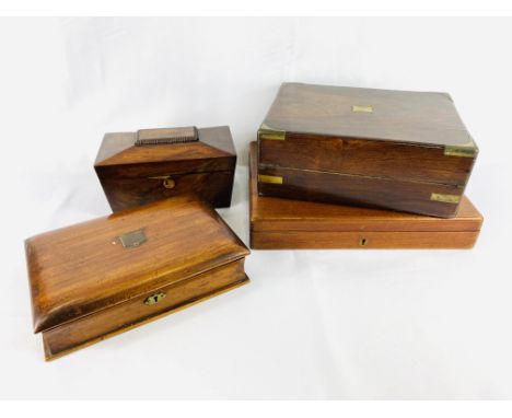 A rosewood writing box with empty interior, 30 x 23 x 12cm; a mahogany cutlery box, with part set of fish knives and forks; a