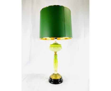 Opaque glass table lamp decorated with hand painted flowers on a brass and bakelite base, height 57cms. No wire included. Est