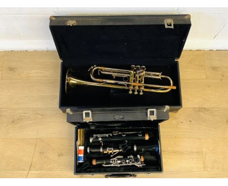 Artley Prelude clarinet in hard case; together with a Blessing Scholastic trumpet (as found) in hard case. Estimate: £20-50