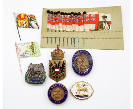 A selection of WW1 era badges and pins. To include: a scarce John Bull ‘To Hell With The Kaiser’ brass and enamel badge with 