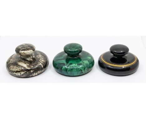 A 19th century malachite enamelled pottery circular paperweight with handle, 10cm diameter together with a 19th century mottl