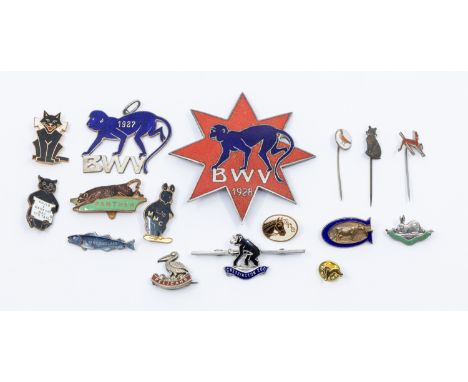 A collection of assorted pin badges comprising of unnamed white metal Beckingham Bunnies, laying down rabbit with green ename
