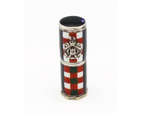 A white metal and enamel Kings Own Scottish Borderers lipstick holder, by Elizabeth Arden, London. Finely enamelled with a da