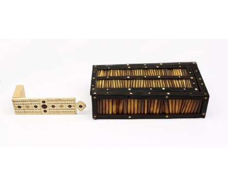 An early 19th century French Napoleonic prisoner of war work carved bone cribbage board. Inset with small tortoiseshell round