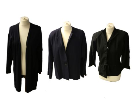 A late 1940s jacket with original shoulder pads (now stained) this stylist jacket has a pin tucked detail a the front and cov