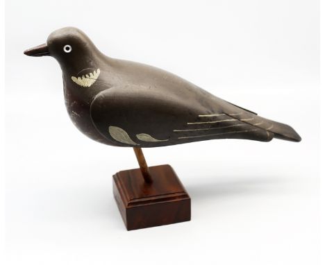 An early 20th century wooden decoy Pigeon, detailed painted wooden model with glass eyes and and red breast, on removable woo
