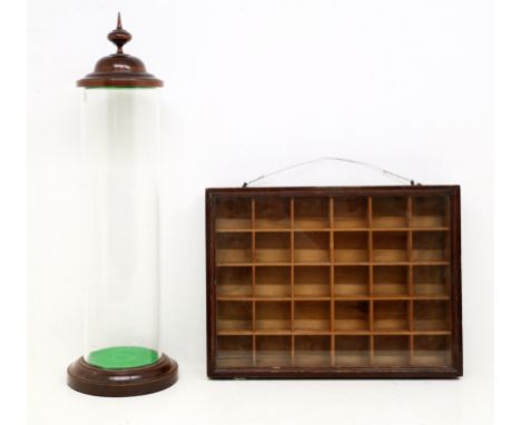 A 20th century tall display cabinet on detachable stand, clear Perspex of cylindrical shape with removable mahogany cover wit