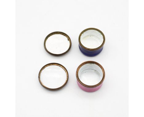 Two 18th century miniature enamel round Bilston patch boxes, circa 1760, one pink ground with the inscription "Keep this for 
