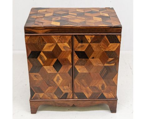 A 19th Century probably Tunbridge Ware parquetry inlaid vari wood jewellery / sewing table casket, the hinged cover opens to 