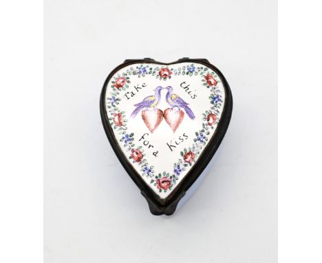 An 18th century heart shaped enamel pill box, Bilston, pale blue ground and the top with a floral border with two doves sitti