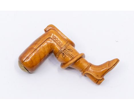 An early to mid 19th century novelty maple wooden pipe tamper, in the shape of a gentleman's leg with snake intertwined aroun