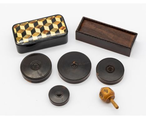 A small collection of treen to include; four circular 19th century lignum vitae seal boxes, three with seals within, largest 