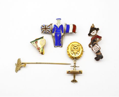 Pin badges; A 1920s Tin Can Fusiliers song sheet music advertising badge, reverse impressed No. 711162 verso, 40mm long, a Ge