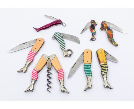 An 20th century German novelty legs corkscrew with pink and white stockings, 6.5cm long together with three 20th century Germ