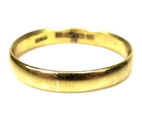 A 22ct gold ring, 3.5mm wide, size R, 3.7g. 