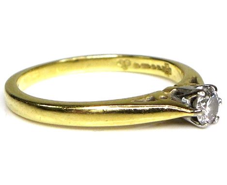 An 18ct gold and diamond solitaire ring, the brilliant cut stone 3.6mm diameter, size K, 2.6g. 