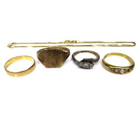 A group of three 18ct gold rings, the first set with diamonds, size I, the second with pearls, a/f one missing, size N/O, and