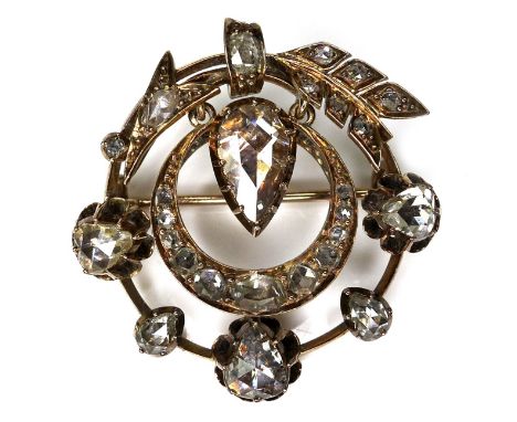 A Victorian multi-stone diamond pendant brooch, set with twenty six diamonds, the central, largest stone pear cut, approximat