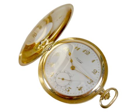 An Art Deco 18ct gold cased half hunter pocket watch, keyless wind, with black Arabic numerals to outer case, the white ename