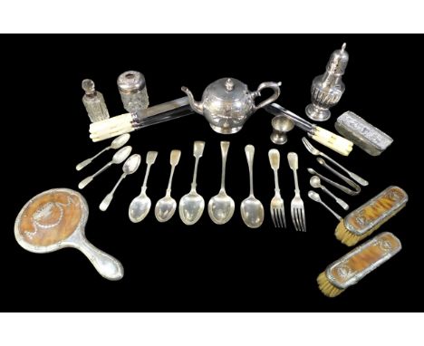 A group of silver items, comprising a George V silver three piece dressing table set, mirror, 25cm, and two hair brushes, eac