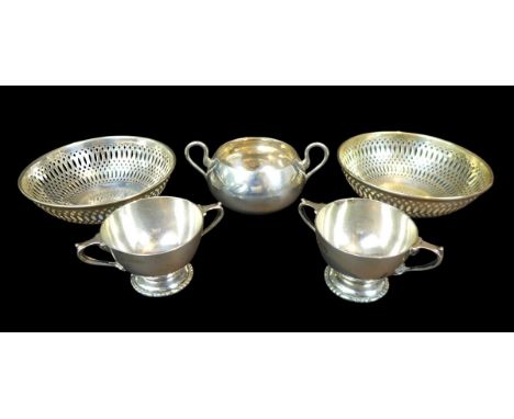 Five pieces of Edwardian and later silver, comprising a pair of bon bon dishes with pierced decoration, Harrison Brothers &am