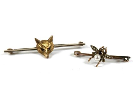 A 9ct gold bar brooch, set with a fox's head mask with ruby eyes, A&amp;W, Birmingham 1990, 51mm, 4.2g, together with a yello
