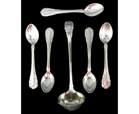 Six pieces of early 20th century and later Georg Jensen Lily of the Valley pattern silver flatware, comprising a cream ladle,