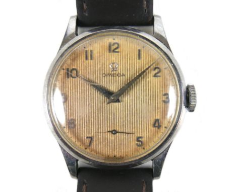 An Omega gentlemen's stainless steel wristwatch, ref 13322, circa 1960, circular tropical dial with vertical bands, gold Arab