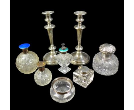 A collection of silver topped ink wells and dressing table bottles, including a Victorian or later large circular form inkwel