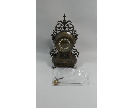 A French Brass Cased Mantle Clock with Key and Pendulum and Movement by Japy Freres. 37cm High 