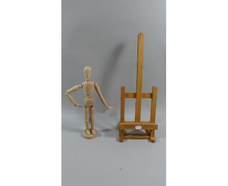 A Wooden Table Top Artists Easel Together with Artists Adjustable Mannequin 