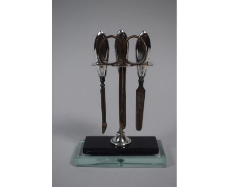 A Silver and Glass Manicure Set with Silver Mounted Tools 
