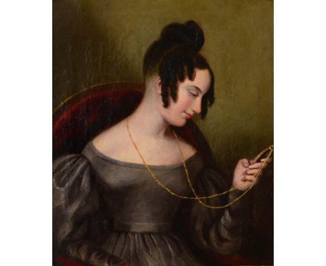 19TH CENTURY ENGLISH SCHOOL Portrait of a lady seated and admiring a miniature, oils on canvas, 23.5 x 19.5cm