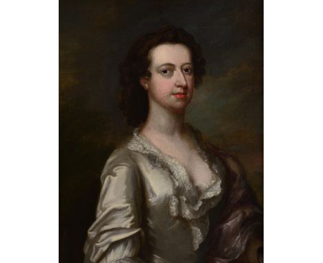 CIRCLE OF SIR GODFREY KNELLER (1646-1723) Portrait of a lady with brown shoulder length hair wearing a lace trimmed satin dre