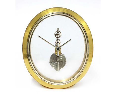 A Jaeger-LeCoultre 'Ovale' desk clock,no. 3581, with a gilt case, a rhodium bezel and eight-day movement, with certificate of