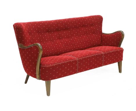 A Danish three-seater sofa,1950s, with red wool upholstery and coloured piping, with wood arms, 173cm wide75cm deep83cm high,