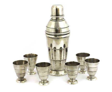 An Art Deco silver-plated cocktail shaker and six beakers,by Thomas Wilkinson &amp; Son, Birmingham, cocktail shaker, 24.5cm 