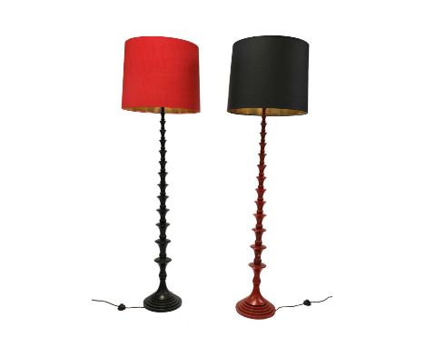 A contemporary standard lamp,with a red shade, and a turned black stand, 210cm high approximatelyCondition report: Three pin 