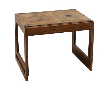 A Danish rosewood nest of three tables, §designed by Johannes Andersen for CFC Silkeborg, each table sliding into one another