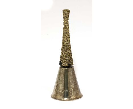 A silver gilt table bell,by Stuart Devlin, London 1970,of tapering spire form with a silver-gilt handle,17.5cm high, 6ozt app