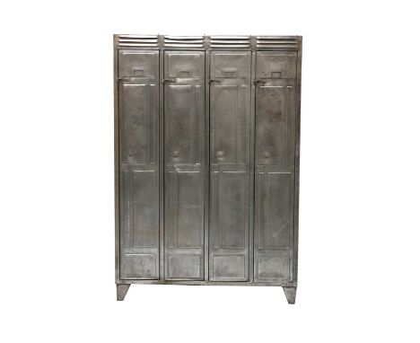 A set of four metal lockers,brushed metal, each opening to reveal a shelf and two hooks, 120.5cm wide40cm deep175cm high (4)C