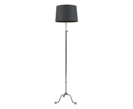 An adjustable standard lamp, with a ringed column, raised on a tripod stand with ball feet, modern shade, 151cm high to fitti