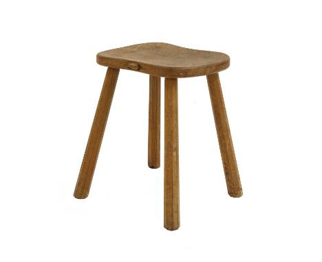 A Robert 'Mouseman' Thompson stool,the dish top, of shaped form, the edge with the signature mouse, raised on four tapering o