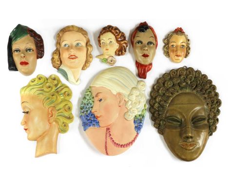 Four Goebel wall masks,various sizes, printed 'Specially designed by Mrs Agnes Richardson', a Beswick ware wall mask,30.5cm l