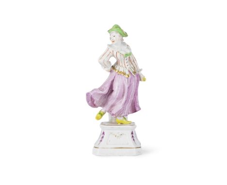 A Höchst figure of Harlequine from the Commedia dell'Arte, circa 1752Modelled by Johann Christoph Ludwig von Lücke, standing 
