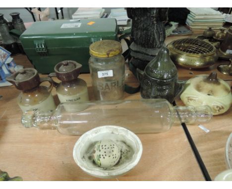 A selection of vintage kitchenalia including jelly mold and glass rolling pin