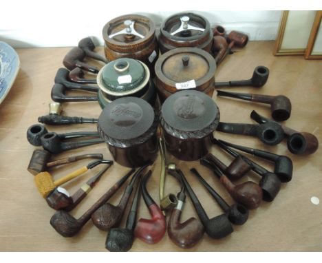 A large selection of tobacciana related items smokers pipe collection, tobacco jars including bakelite and treen,   