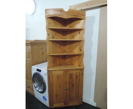 A pine corner shelf unit