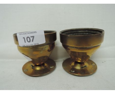 A pair of trench art hand worked brass trinket dishes 
